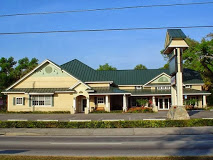 a close up of a street in front of a house